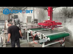 Automatische machine voor het laden en lossen van blokken met meerdere blokken en voor het palletiseren van hele lagen